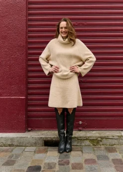 Beige patentstickad tröja