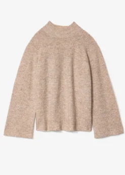 Beige ribbstickad tröja