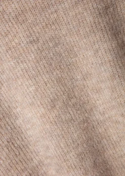 Beige ribbstickad tröja