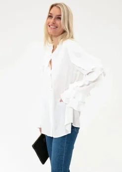Blus med volanger