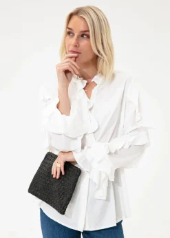 Blus med volanger