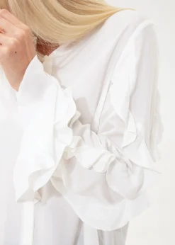 Blus med volanger