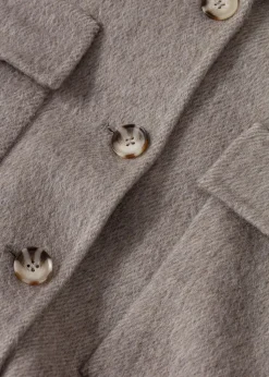 Grå/beige ulljacka med fransar