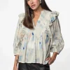 Mönstrad bomullsblus med volang