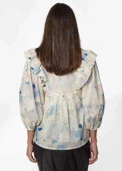 Mönstrad bomullsblus med volang