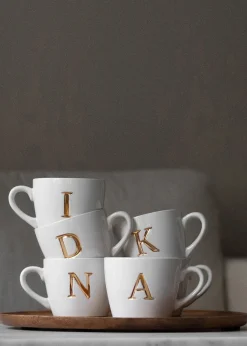 Mugg med bokstav