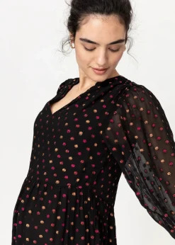 Prickig klänning