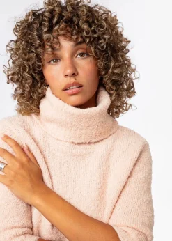 Rosa stickad bouclétröja