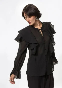 Svart blus med volang