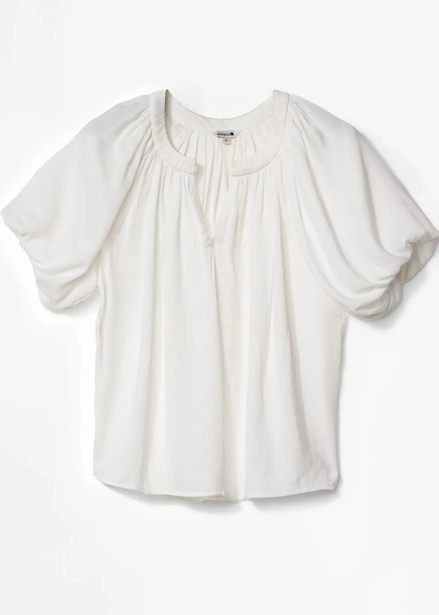 Vit blus med puffärm