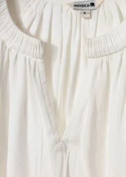 Vit blus med puffärm